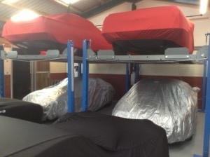 Cars in multi-level storage systems at Classic Car Storage UK. 