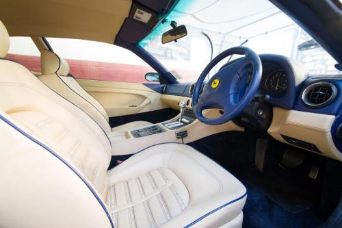 Luxury white leather interior of a classic Ferrari. 