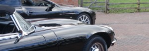 A classic Jaguar and Aston Martin at Classic Car Storage UK. 